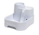 A side angled view of the empty white 3 level pet fountain which is suitable for cats and small dogs
