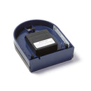 The underside of the dark blue aquarium fish feeder, displaying the battery case which provides power to the automatic feeder.