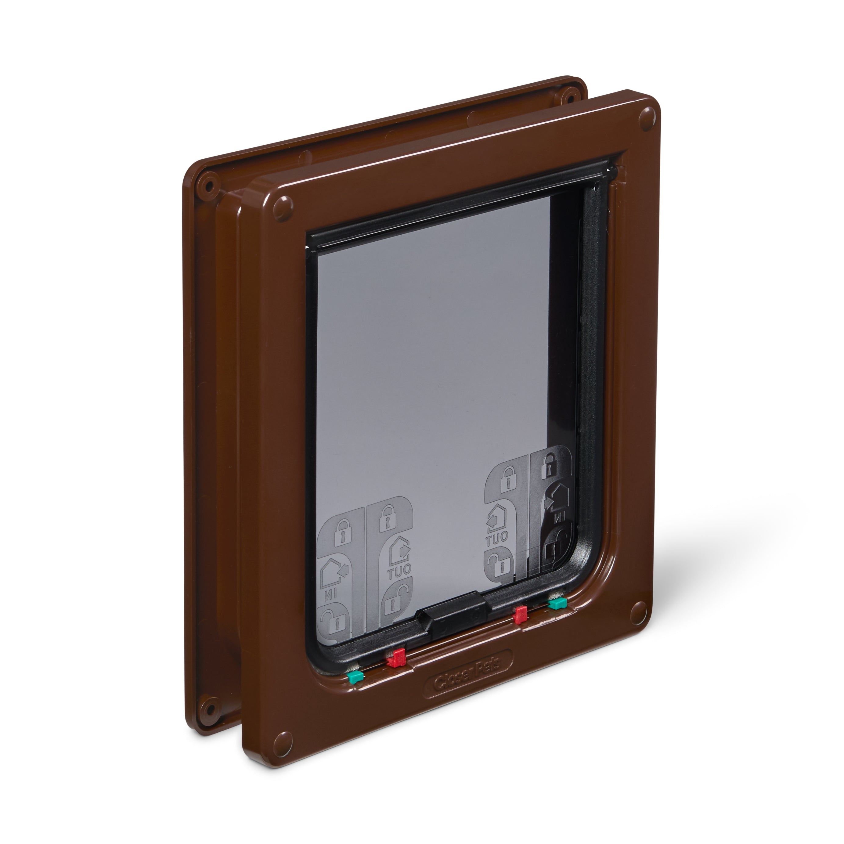 An angled view of the brown cat flap frame with clear flap, showing the four-way red and green manual locks on a white background