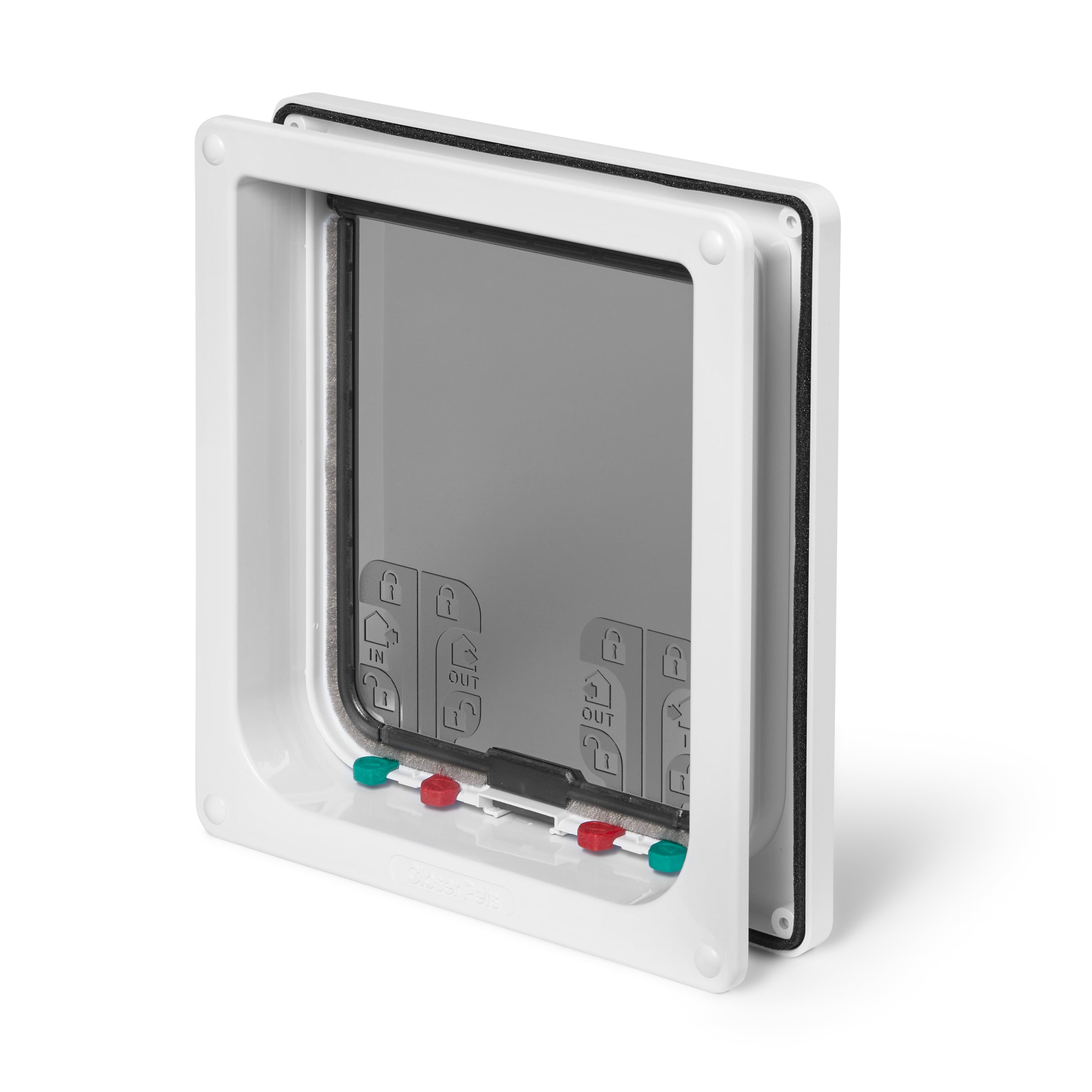 An angled view of the back side of the white-framed manual locking pet door made by Cat Mate on a white background