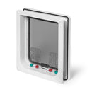 An angled view of the back side of the white-framed manual locking pet door made by Cat Mate on a white background