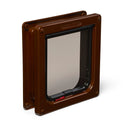A front side view of a brown pet door frame with a clear flap that can be installed in to various types of door, on a white background