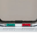 Close-up of a white cat flap with 'OUT ONLY' and 'IN ONLY' labels on a white background
