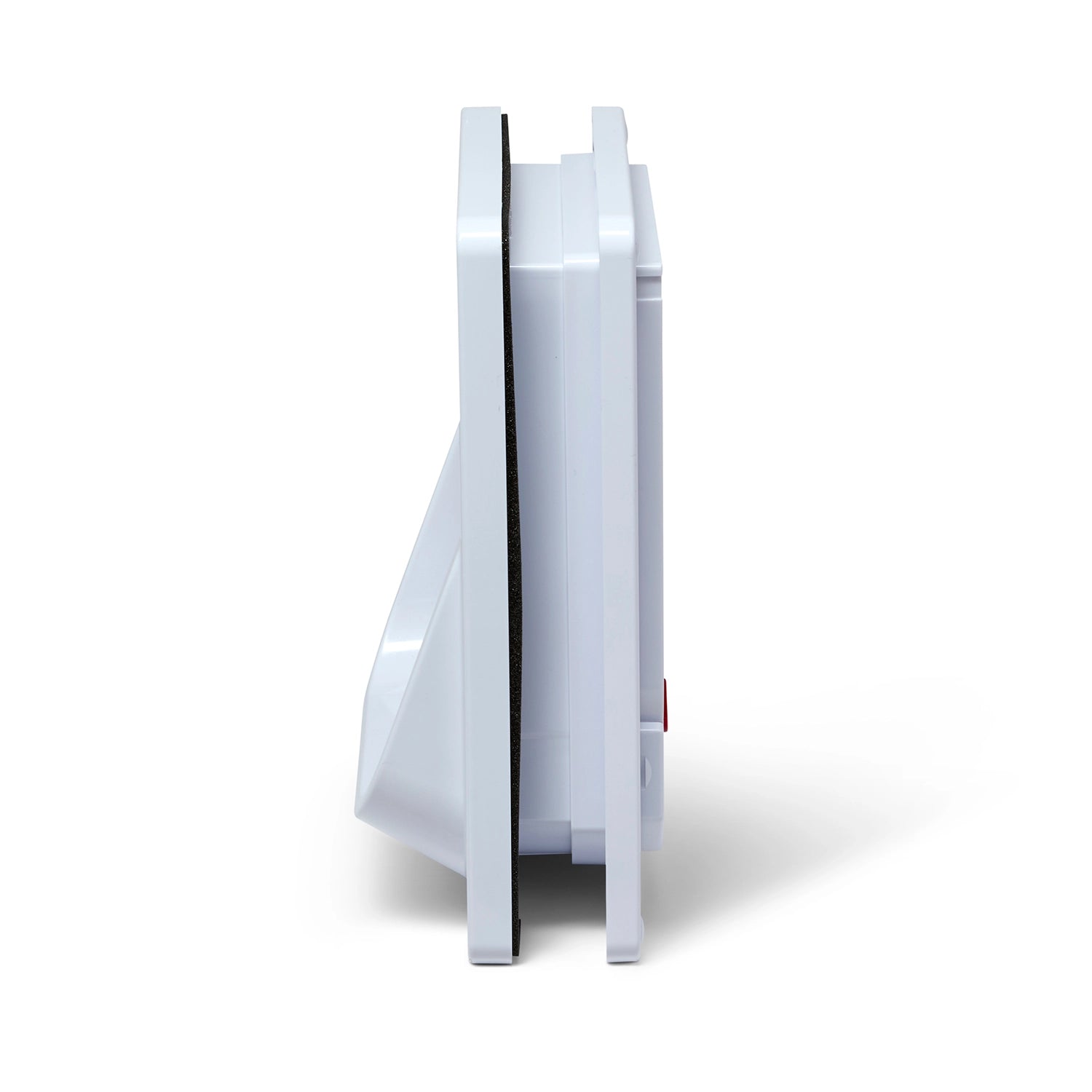 A side view of the electromagnetic cat flap in white, on a white background