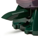 Close-up of a green plastic chute to dispense dry fish food on a white background