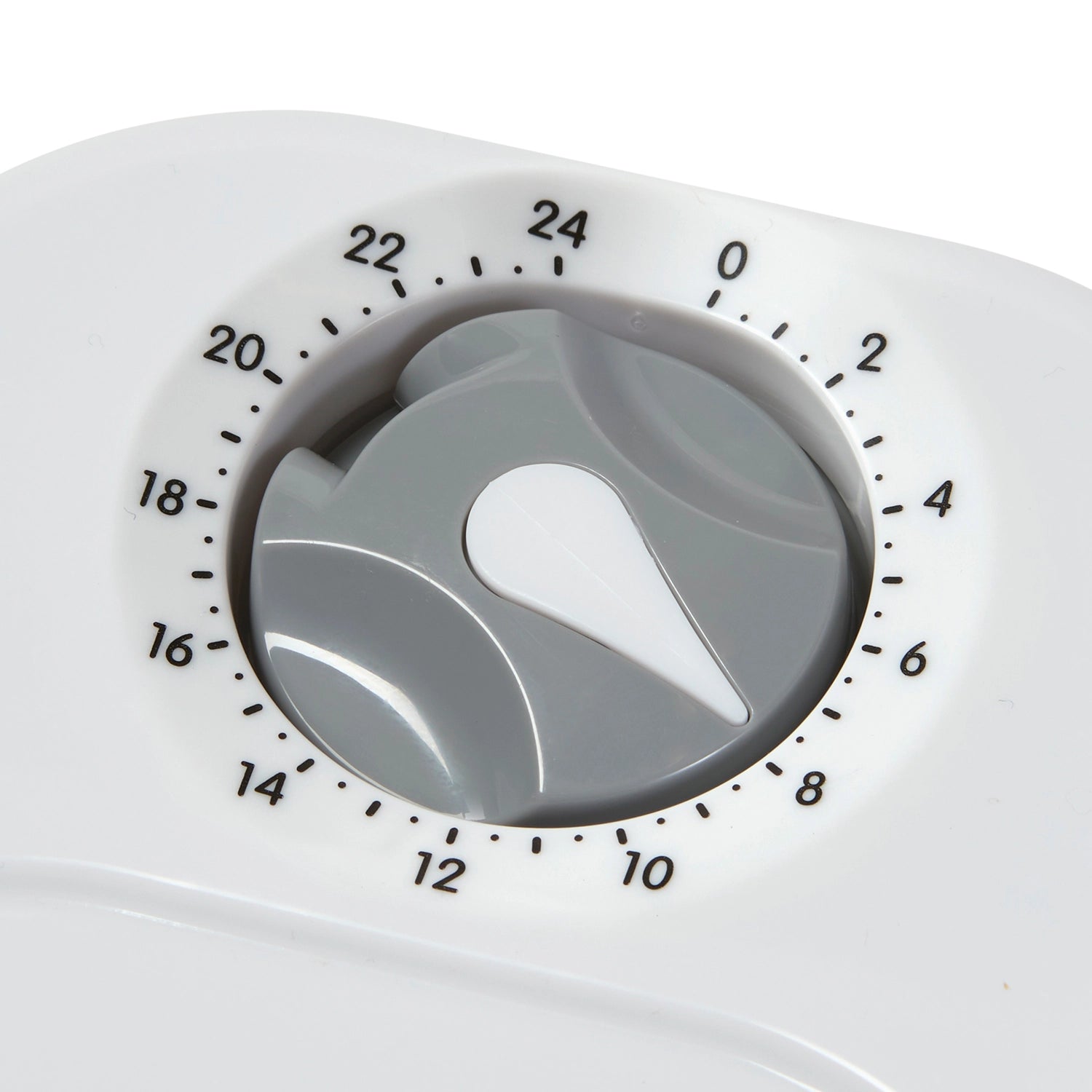 Close-up of a grey mechanical timer with a white dial with a white background