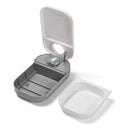 An empty single meal pet feeder in grey and white, with the dishwasher safe white food bowl removed and placed next to it on a white background