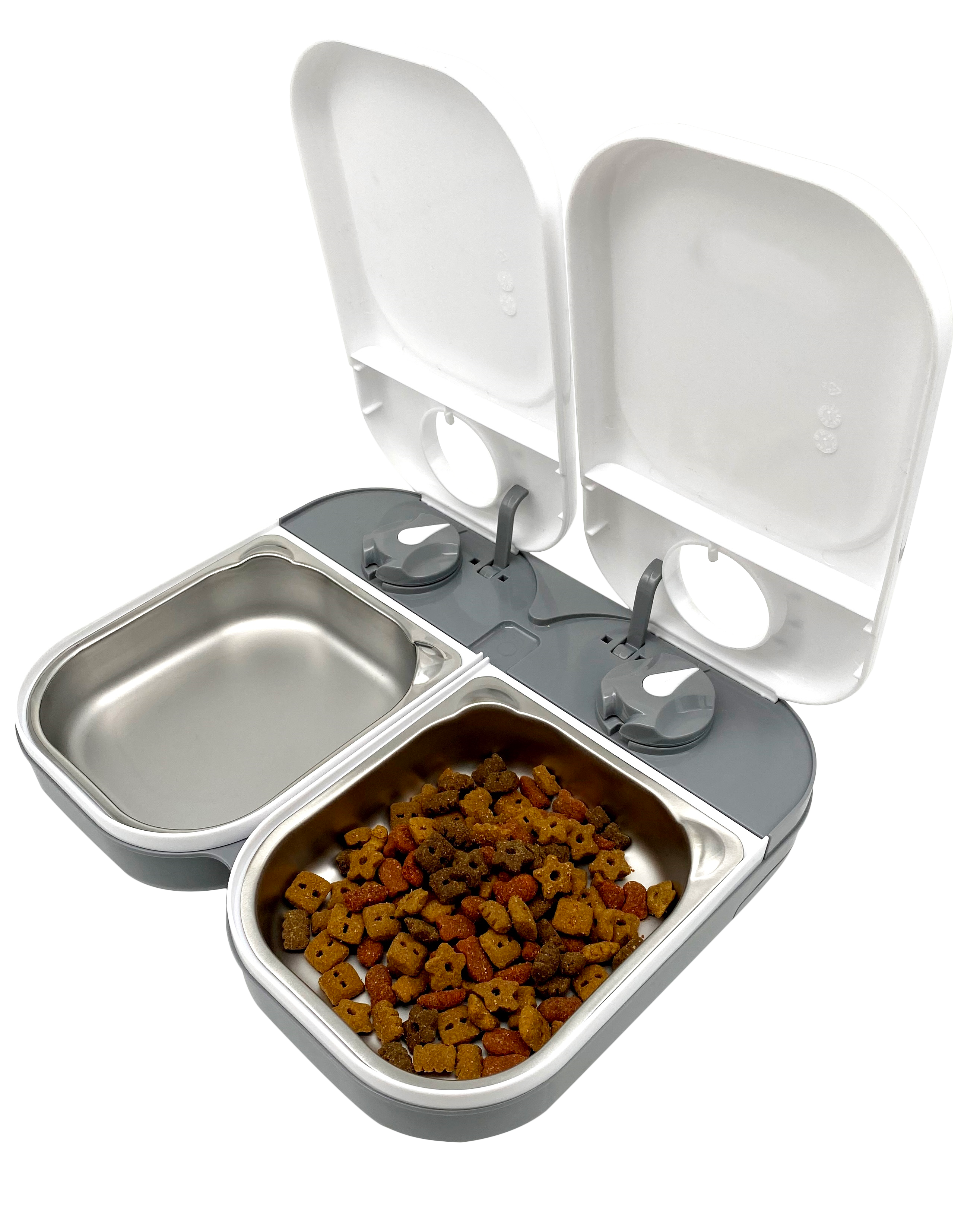 A side on view of the two meal automatic pet feeder with open lids, one stainless steel bowl is empty and the other bowl contains dry pet food