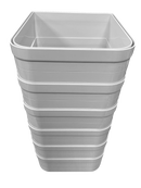 A stack of six white wall liners for cat flaps on a clear background 