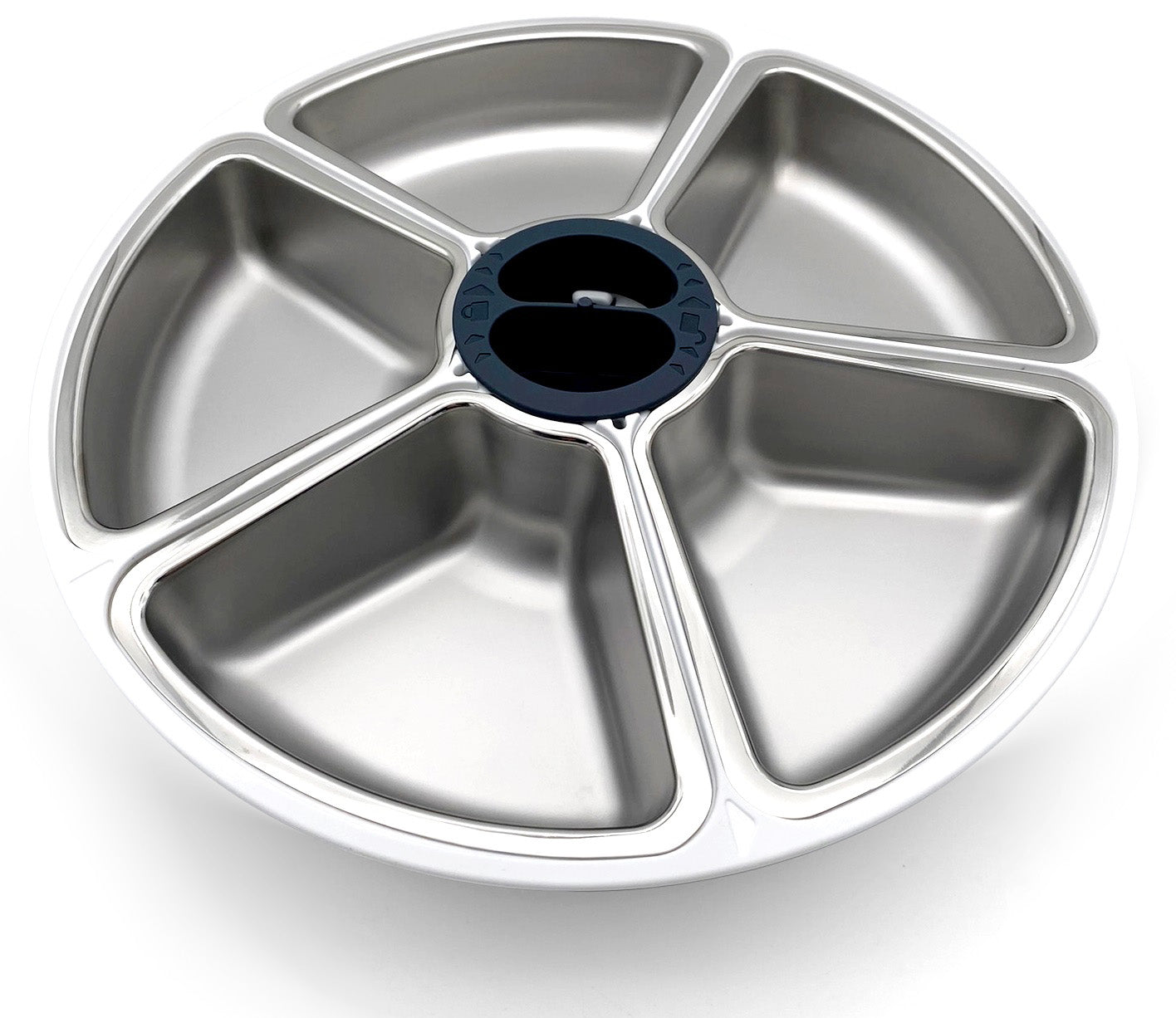A top view of the five stainless steel  dish inserts placed on the white feeder carousel on a white background 