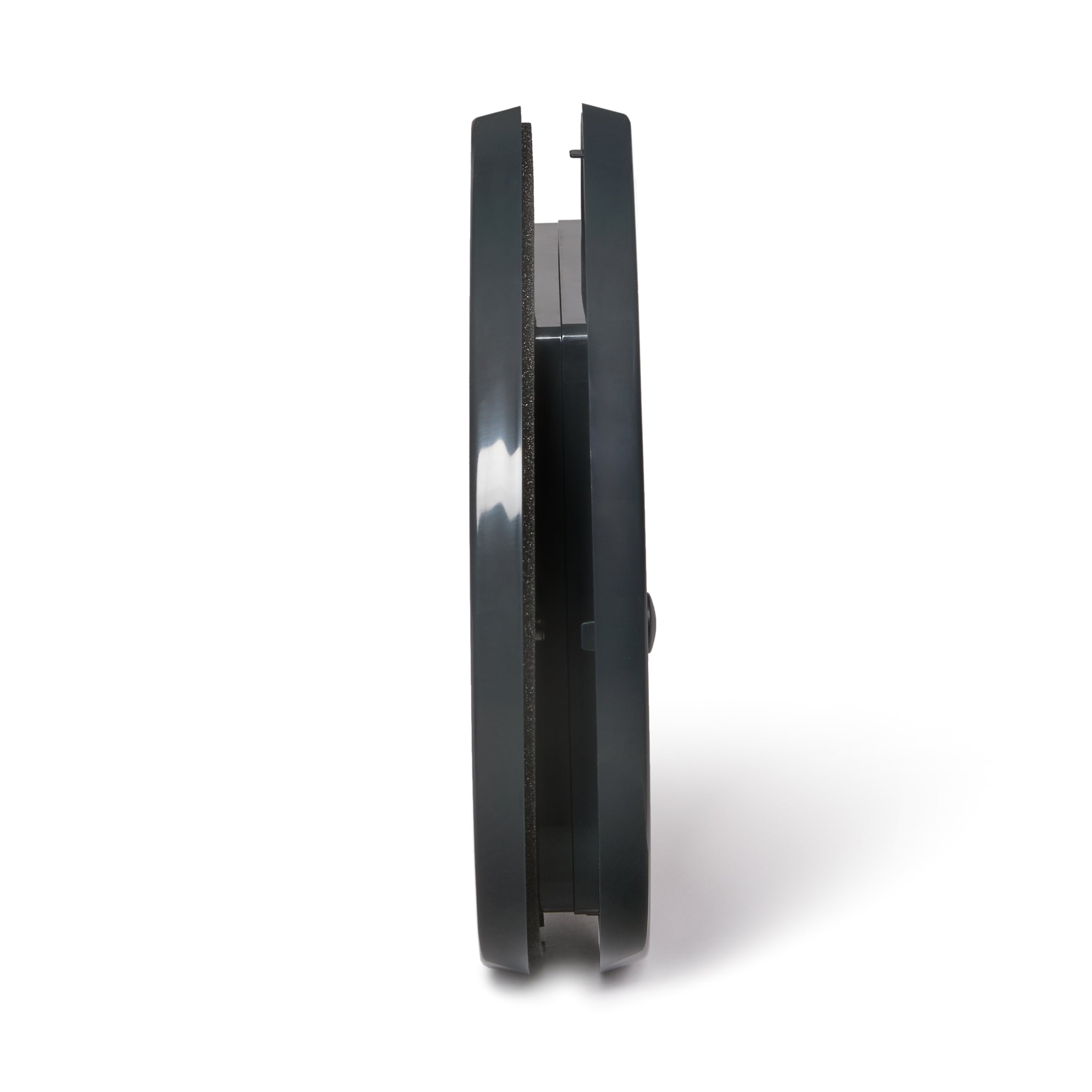 A side view of the grey cat door which is self lining up to one and a a quarter inches thick  which is suitable for installation in to glass panels. 