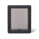 Pet door in grey with a translucent flap and magnetic closure which is suitable for all cat breeds and medium size dogs on a white background