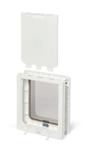 A composite view of the white medium dog door with a white two way locking security panel positioned above the frame of the pet door, to demonstrate the purpose of the locking panel, on a white background 