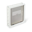 A side angle view of the white pet door for larger dog breeds with a clear flap on a white background