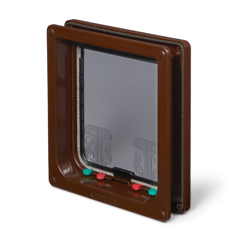 Brown pet door for large cats with a transparent flap and draught-proof and weather-proof brush seal and magnetic closure on a white background