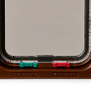 Close-up of a brown cat door flap with the grey draft proof brushing with 'IN ONLY' and 'OUT ONLY' labels on a white background