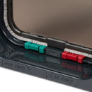 A close-up view of the red and green manual locks on the grey cat flap with 'in only and 'out only' labels underneath with directional arrows beside them, on a white background 