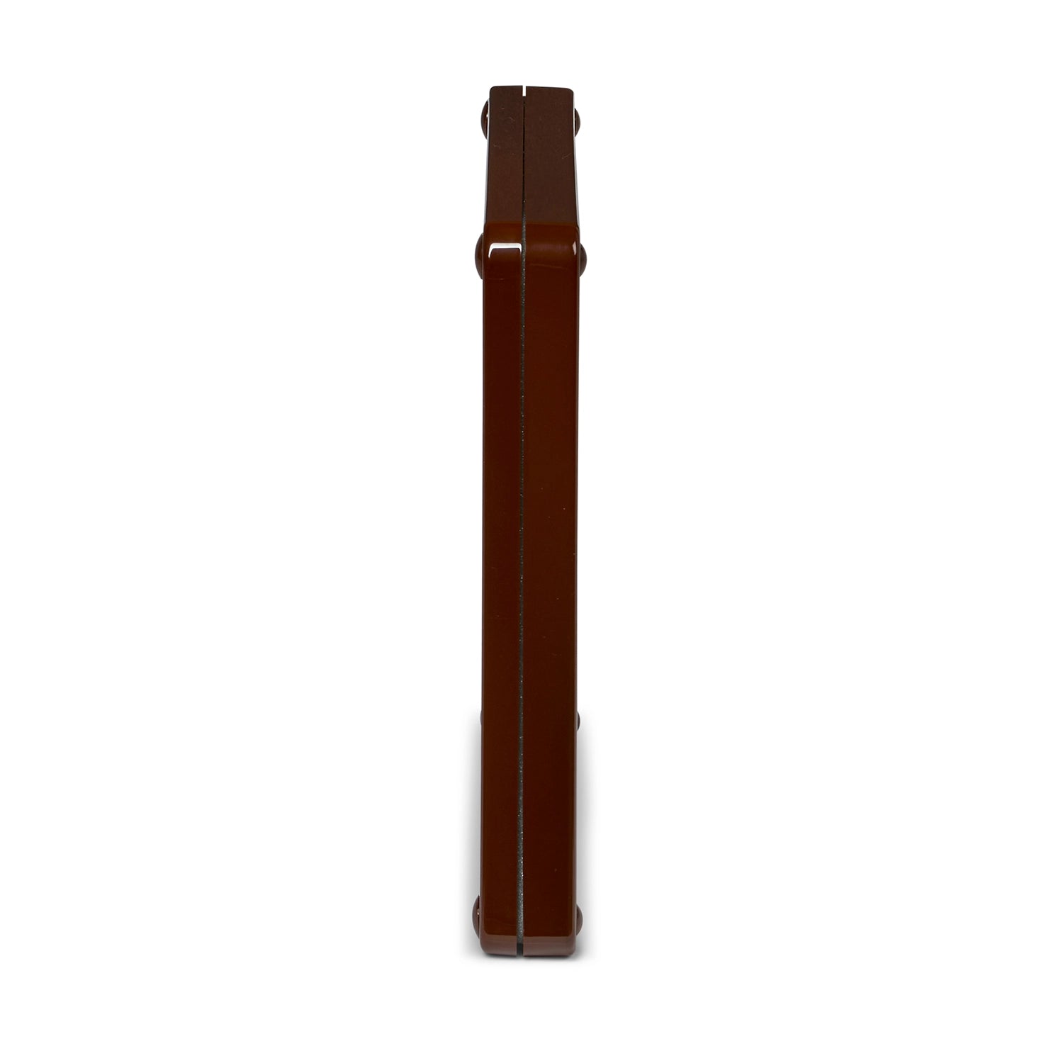A side on view of the brown manual locking cat flap which shows it's width and that it is self lining up to half an inch, on a white background 