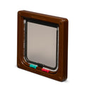 A side angle view of the back of the pet door for average size cats with a brown frame on a white background