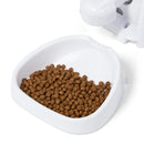 White bowl filled with brown pet food on a white background