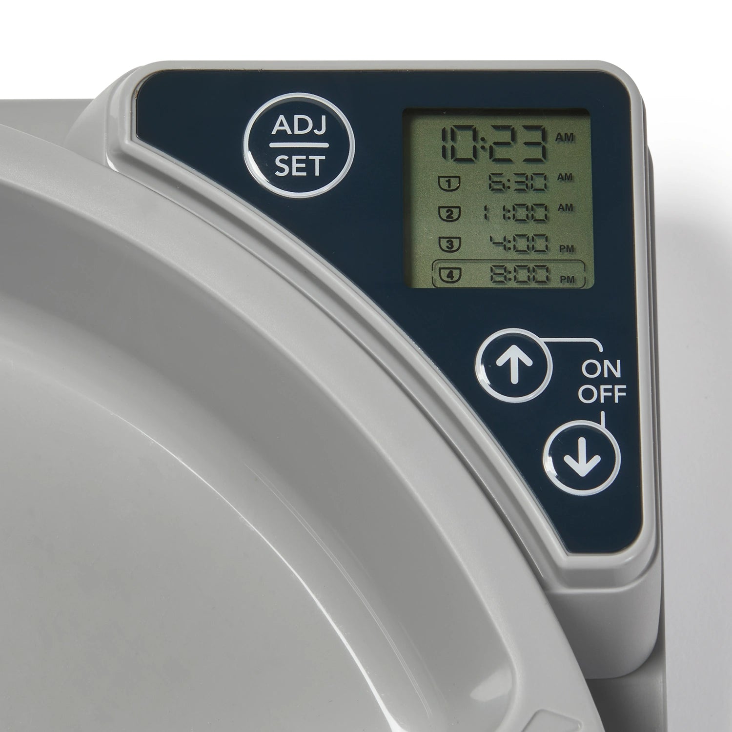 Close-up of Cat Mate automatic pet feeder digital control panel showing LCD display with programmed feeding times (10:23 AM, 11:00 AM, 4:00 PM, 6:00 PM, 9:30 PM), ADJ/SET button at top, and ON/OFF toggle buttons with up/down arrows on dark coloured interface