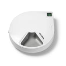 A white five meal automatic pet feeder made by Cat Mate displaying an empty bowl at the front of the image, on a white background 
