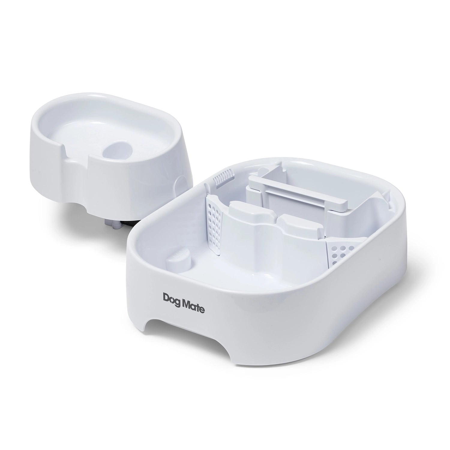 The white Dog Mate drinking fountain has been split in to two sections, showing the inside of the bottom tier, which includes the filter housing on a white background 