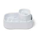 A view of the side of the two level white pet water fountain on a white background