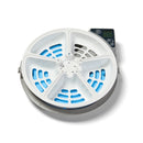 Top-down view of the inside of a circular automatic pet feeder. The feeder contains a white five-compartment rotating tray with ventilation slots revealing blue ice packs beneath, designed to keep wet food cool. At the top right, there is a digital control panel with a display screen and buttons for programming feeding times. The compartments are evenly spaced, allowing for multiple scheduled meals