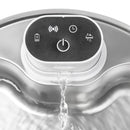 Close-up of a pet water fountain with control panel and water flowing.