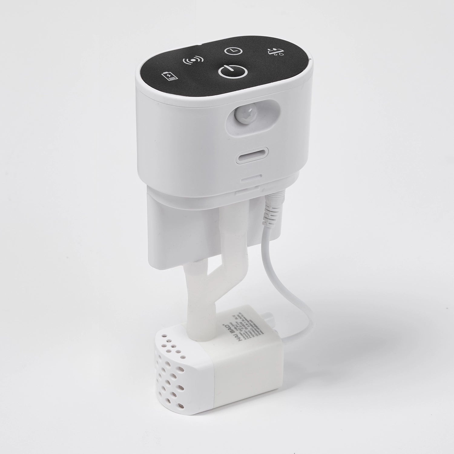 A side-angled view of the white cordless pump with a black top and white button icons which powers the Cat Mate stainless steel pet drinking fountain on a white background 